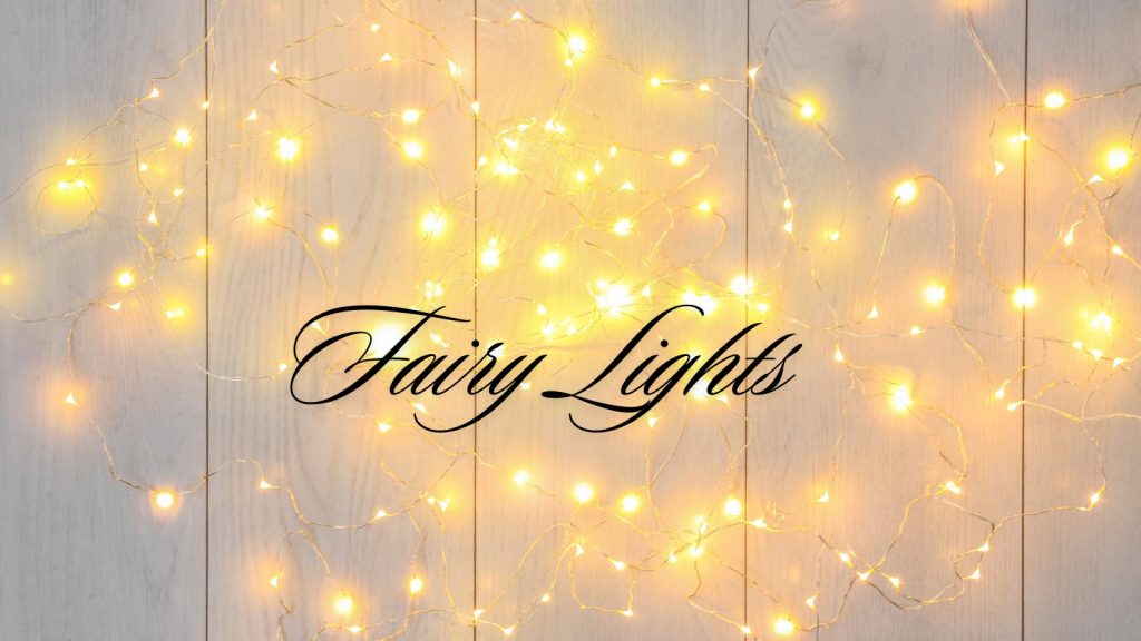 fairy lights around window boxes